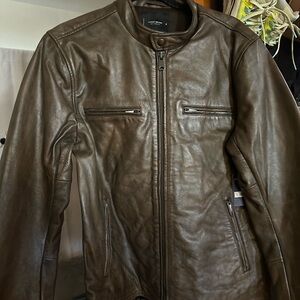 Brand new, never worn, brown leather Lucky Brand jacket.